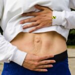 gewölbter unterbauch frau